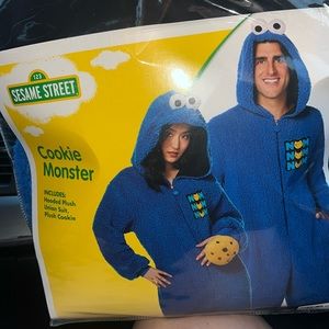 Cookie Monster hooded plush onesie with zipper and comes with a plush cookie 🍪